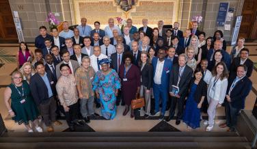 Director-General Ngozi Okonjo-Iweala and DDG Xiangchen Zhang with participants of the Chairs Programme